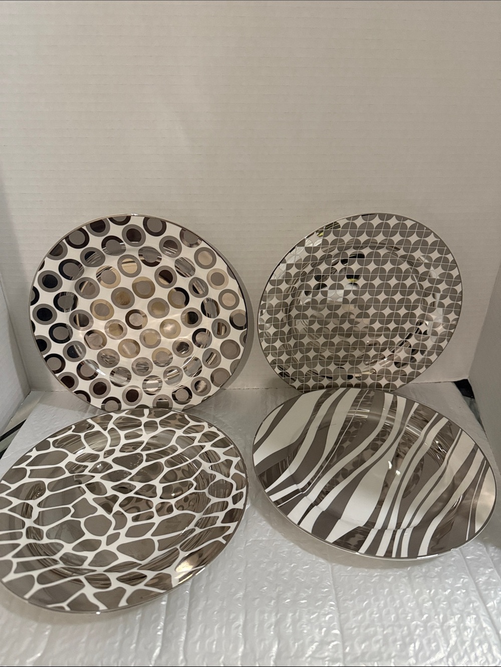 Set of 4 Decorative Patterned Plates in Metallic Silver